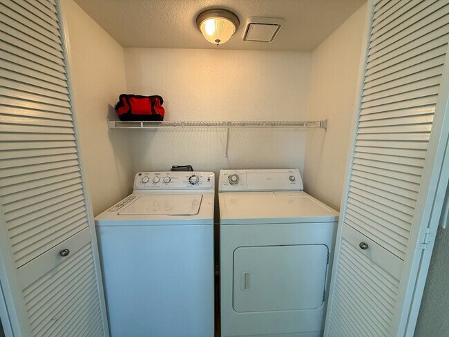 Building Photo - Bright & Furnished 2-Bedroom, 2-Bath Condo with Poolside Views