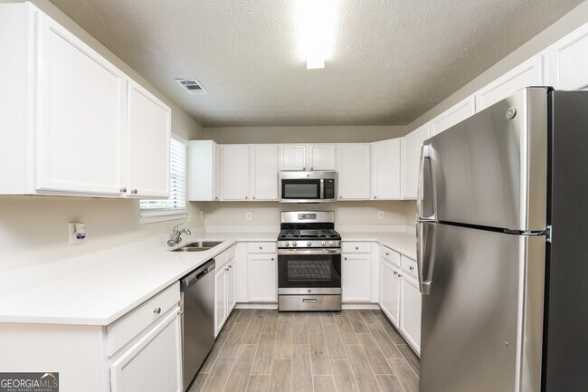 Building Photo - 4547 Carriage Park Dr