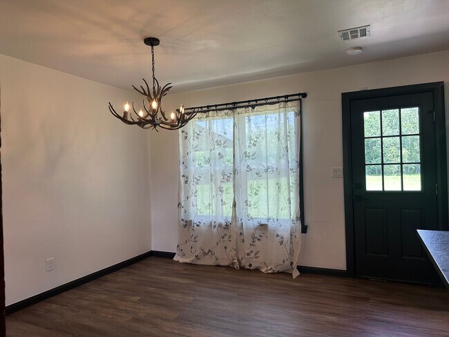Building Photo - Welcome to country living with a fresh, modern twist.