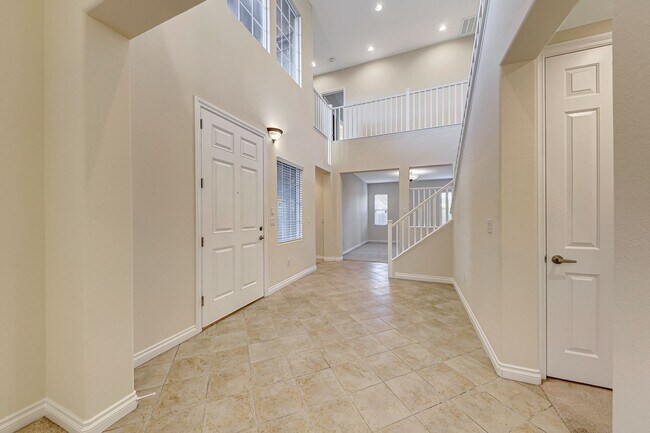Building Photo - 5 Bedroom Corner Lot Home in Gated Community!