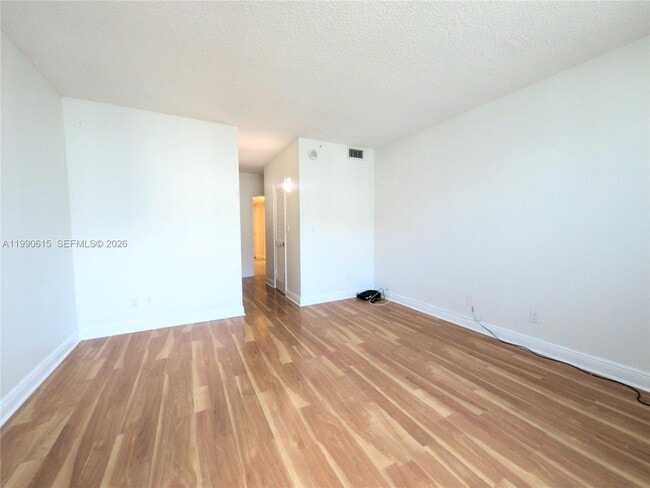 Building Photo - 19380 Collins Ave