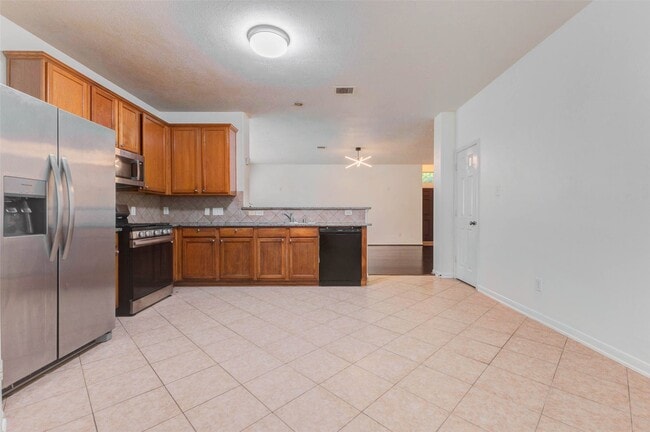 Building Photo - 7434 Jacobs Well Dr