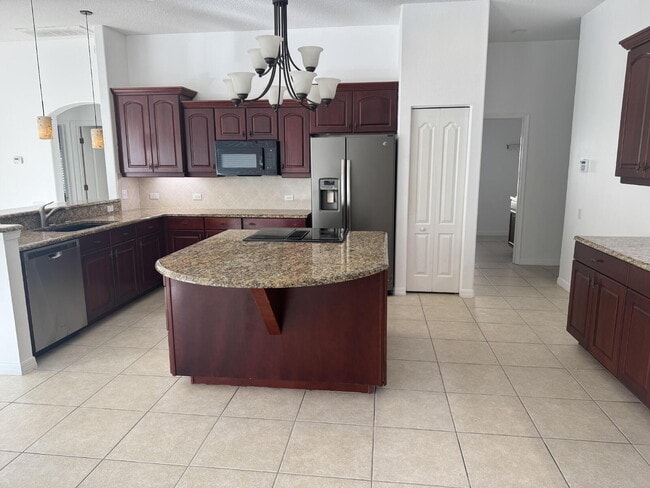 Building Photo - "Spacious 4-Bed, 4-Bath Gem in Wesley Chap...