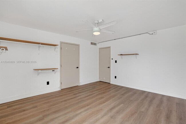 Building Photo - 10240 Collins Ave