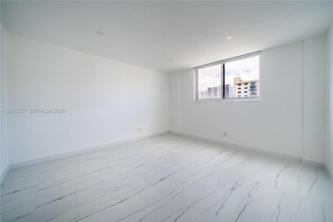 Building Photo - 19380 Collins Ave