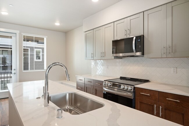 Building Photo - NEW CONSTRUCTION | 2-Bedroom + Office Town...