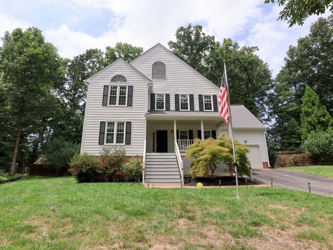 Primary Photo - Spacious 4-Bedroom with Fenced Yard, Deck,...