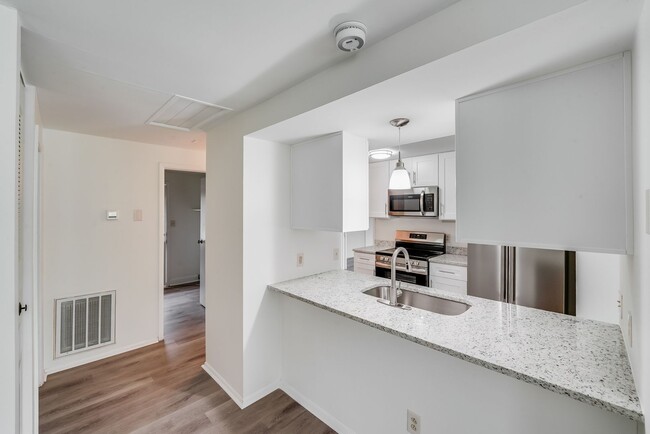 Building Photo - Fully Renovated 2BR Home with New Deck & L...