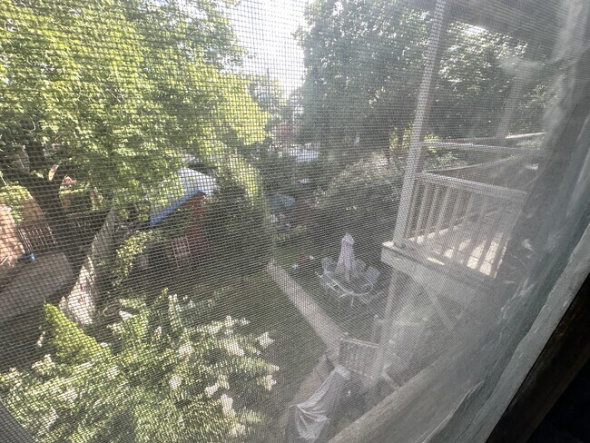 Back porch from bedroom window - 3016 Victor St