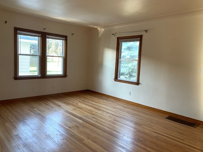 Building Photo - Three bedroom home with beautiful hardwood floors and central air!