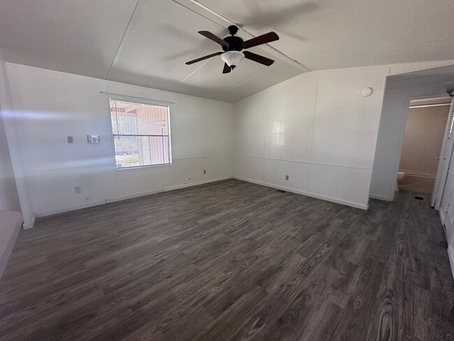 Building Photo - 2br 1Ba Manufactured Home with large Patio Front/Rear yard plus garden area