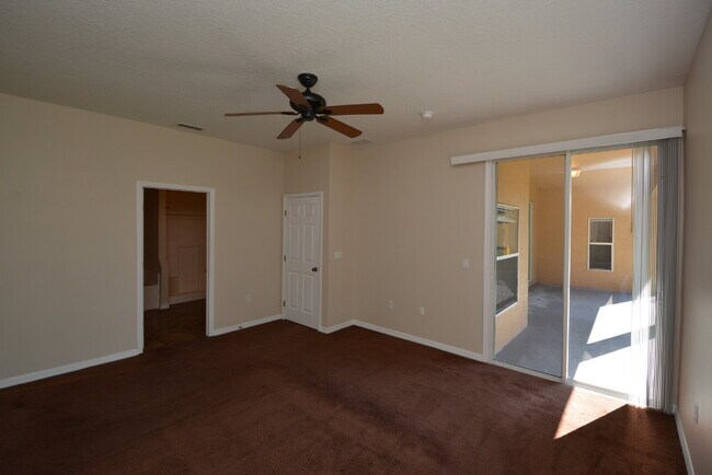Building Photo - "Spacious 4-Bed Oasis in Palm Coast with 2...