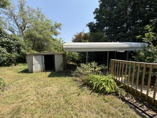 Building Photo - Three Levels of Living with 4 Bedrooms, 2 Full Bathrooms and Multiple Living Areas!
