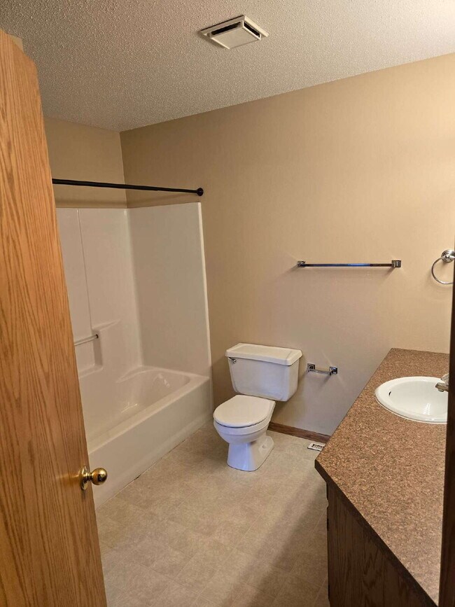 Building Photo - "Charming 3-Bedroom Fargo Home with 2 Full...