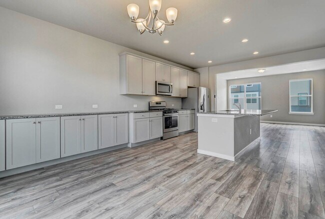 Building Photo - Modern 4BR with Open Kitchen, Patio & 2-Car Garage