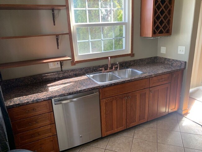 Building Photo - Great Location! Great House! Enjoy baseball games and the park attractions