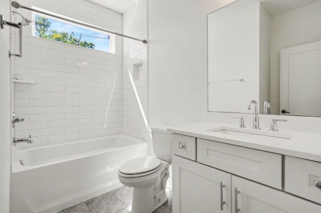 Building Photo - Downtown Views with Contemporary Comfort!