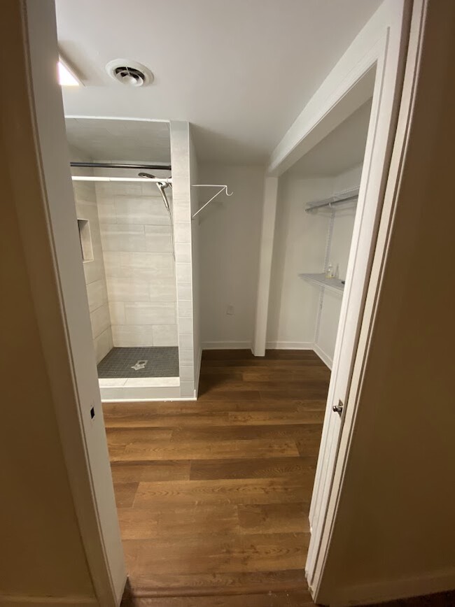 downstairs full bath with shower and closet - 3705 Pfost Ave