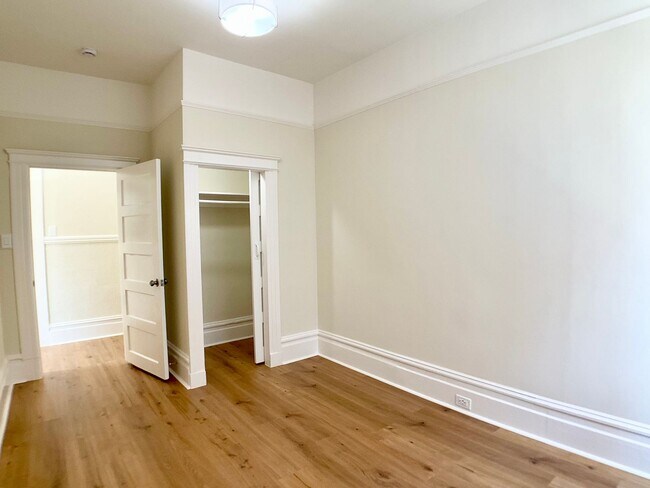 Building Photo - LOWERED PRICE! FULL FLOOR FLAT! Bay Window...