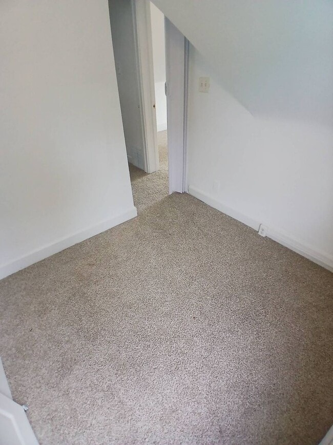Building Photo - Newly Renovated 4BR/1BA Single-Family Home with Garage – Cleveland