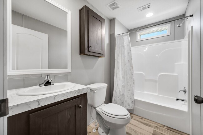 Building Photo - Experience exceptional living at its finest