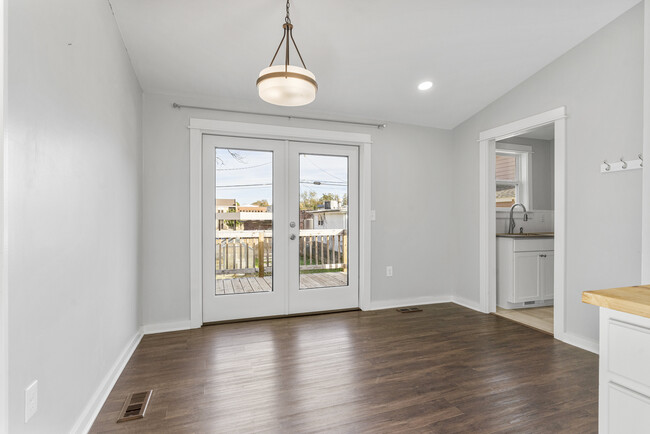 Dining Room & Exit to Backyard - 117 S Water St