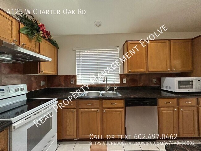 Building Photo - 4125 W Charter Oak Rd