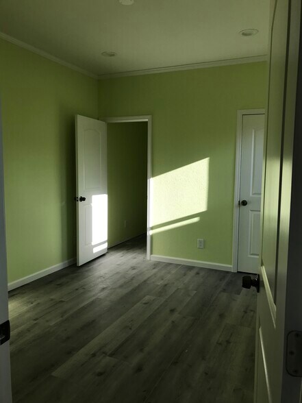 bedroom-2, entry to master bathroombathroom - 3120 Mauricia Ave