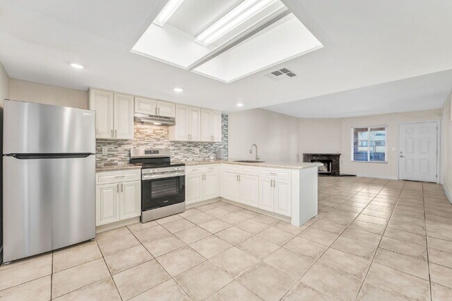 Building Photo - FULLY REMODELED UPSTAIRS CONDO | 3 BEDROOM | GRANITE COUNTERS | LAKE MEAD & JONES