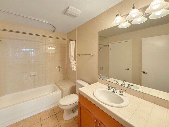 Building Photo - Newly Remodeled 2B/2BA condo w/ Reserved P...
