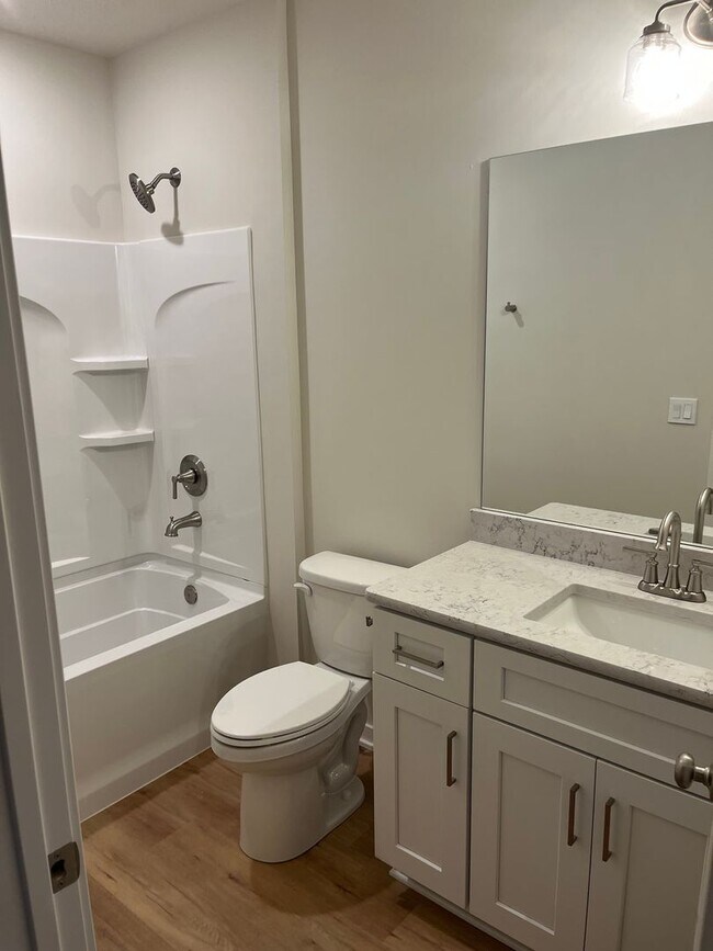 Building Photo - Spacious 5-Bedroom Duplex Near Asbury Elementary with Finished Basement & Full Amenities