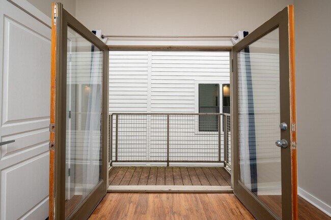 Building Photo - **WALKABLE MIDTOWN CONDO WITH BALCONY AND ...