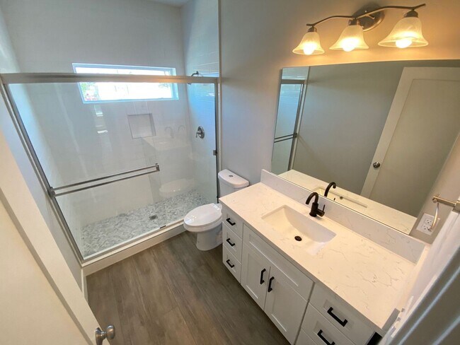 Building Photo - 4BD/2BA with designated yard space!