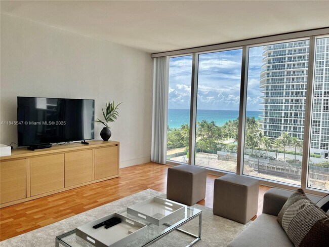 Building Photo - 10275 Collins Ave