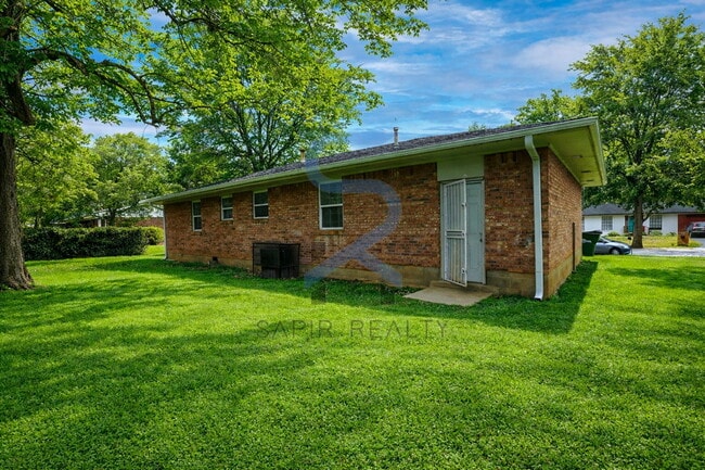 Building Photo - Timeless Ranch Charm in a Vibrant, Peaceful Corner of South River Gardens