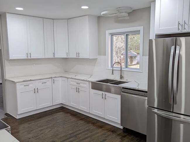 Building Photo - this contemporary & brightly remodeled 2,400 sqft home