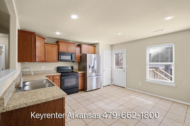 Building Photo - Move-In Ready 4 Bedroom with Gorgeous Natural Light & Spacious Yard in Centerton