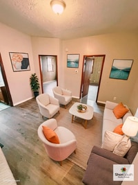 Building Photo - Updated 2 bed 1 bath main floor apartment with covered detached garage