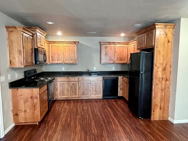 Building Photo - NEW LUXURY DUPLEX in the sought-after Deer Brook neighborhood is now available!