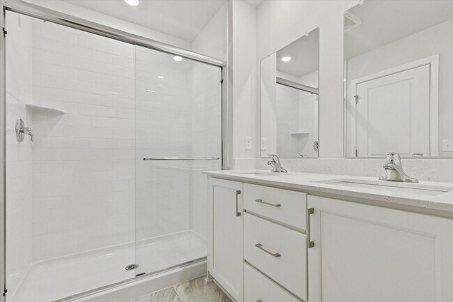 Building Photo - Brand New River Pointe townhome with modern finishes, flexible living space, and a prime location...