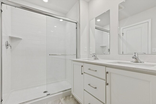 Building Photo - COMING SOON! Brand New River Pointe townhome with modern finishes, flexible living space, and a p...