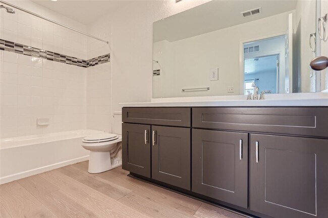 Building Photo - 3-Bedroom Home with Open Floor Plan, Private Balcony & Attached Garage