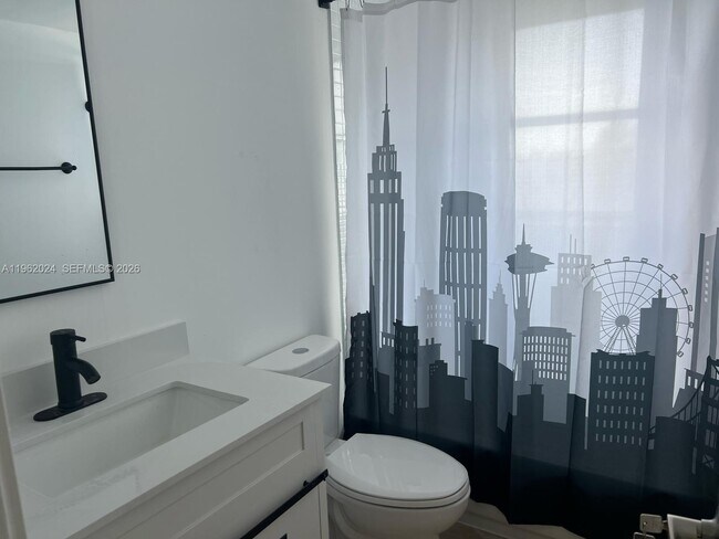 Building Photo - 8560 N Sherman Cir