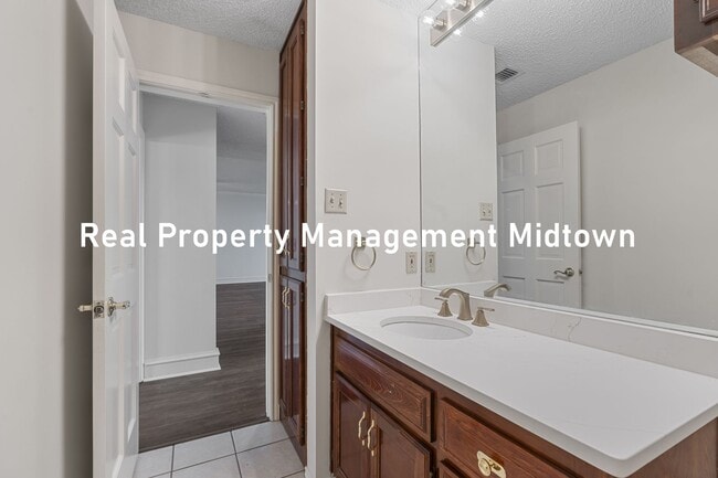 Building Photo - Charming Condo in Established Community of...