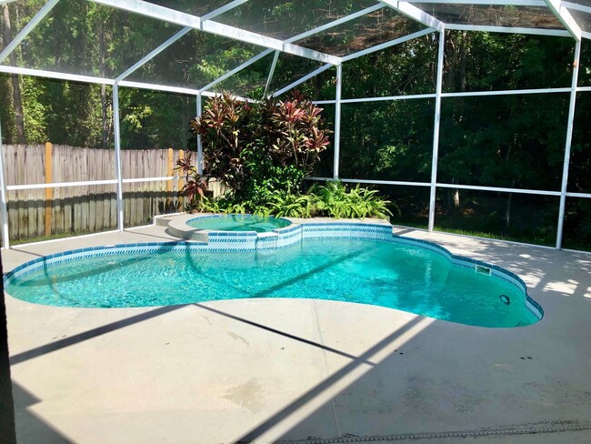 Building Photo - SPACOUS  3/2 OVIEDO POOL HOME in Twin Rivers!