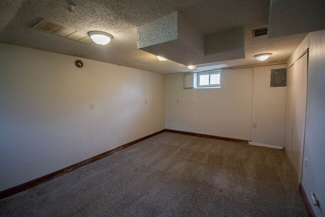 Building Photo - Bright, freshly painted home with HUGE garage space!