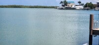 Building Photo - Coastal Waterfront Pool Home in Paradise at Isles of Capri
