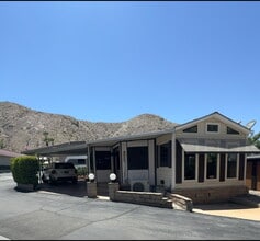 Building Photo - Peaceful Desert Retreat in Gated 55+ Community | Corner Lot with Double Entry Driveway