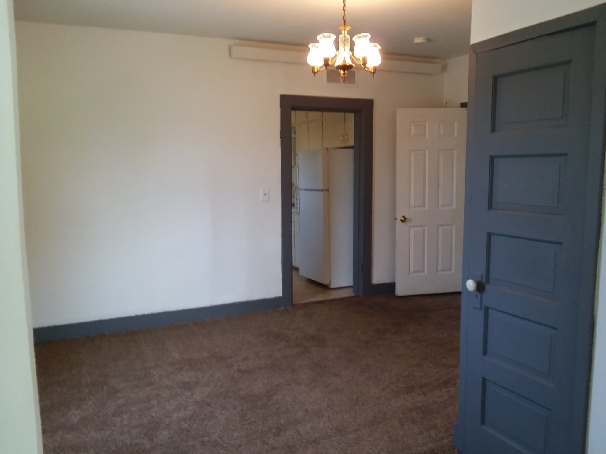 Sitting room with its own storage space - 221 Bridge St