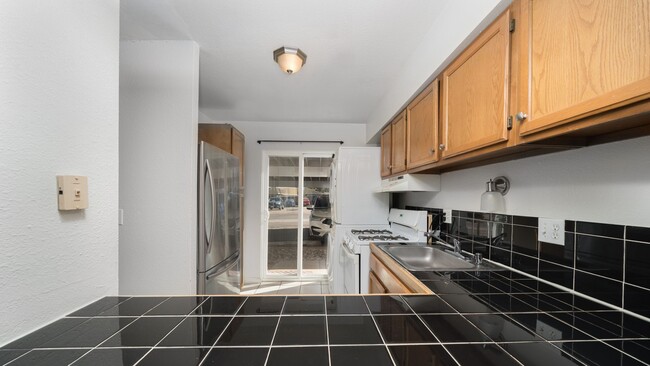 Building Photo - Two bedroom Condo Near Palmer Park with AC